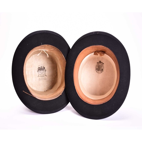 433 - Two black silk top hats, in vintage card hat boxes Lincoln Bennett & Co., London, size approx. 53.5c... 