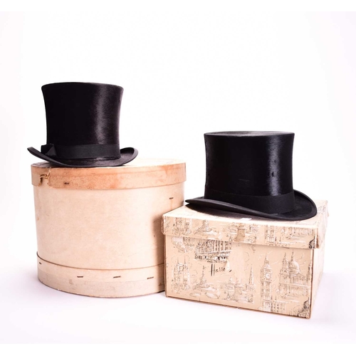 433 - Two black silk top hats, in vintage card hat boxes Lincoln Bennett & Co., London, size approx. 53.5c... 