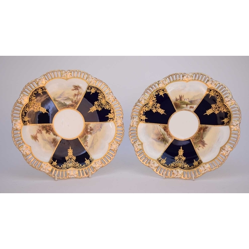 51 - A pair of Coalport plates, circa 1850-60, of shaped, circular form, painted with fan-shaped panels o... 