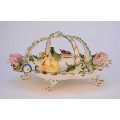 68 - A scarce Coalport 'Coalbrookdale' fruit basket, circa 1830, with rare handle shape, centrally painte... 