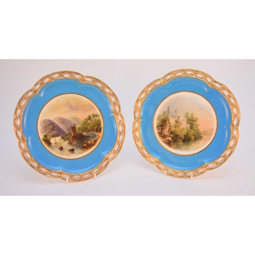 81 - A pair of Coalport pierced plates, circa 1860, the bleu celeste grounds painted with Irish views of ... 