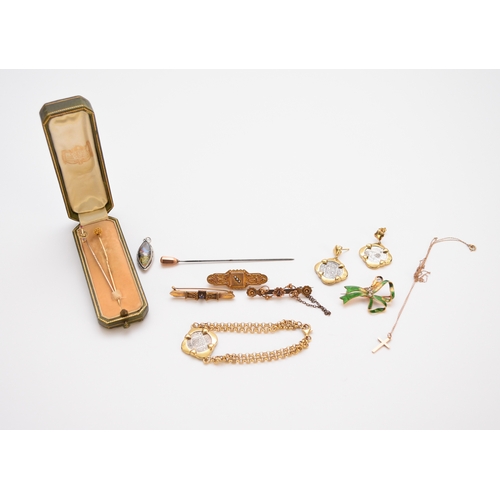 107 - A small collection of jewellery, comprising; a diamond and green enamel sylised bow brooch fob, stam... 