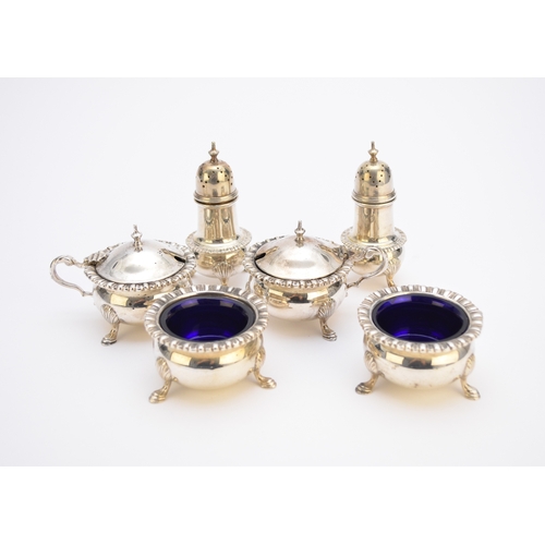 32 - A six piece silver cruet set, Blackmore & Fletcher Ltd, Birmingham 1934, each piece of circular form... 