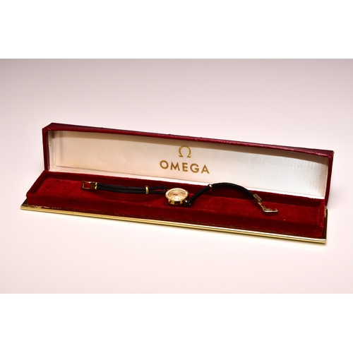 358 - Omega: A lady's gold-plated wristwatch, ref. 511.107, cal.483 17-jewel manual, champagne dial with b... 