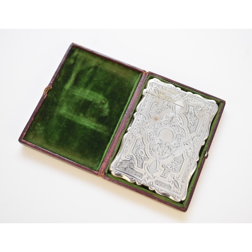 36 - A Victorian silver card case, HA, Birmingham 1867, with bright cut engraved decoration, 10cm high, w... 