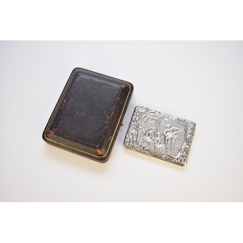 39 - A cased Edwardian silver card/stamp case, Sydney & Co, Birmingham 1903, with figural decoration to o... 