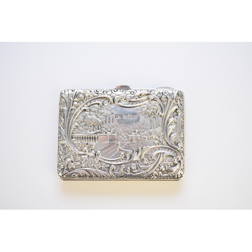 39 - A cased Edwardian silver card/stamp case, Sydney & Co, Birmingham 1903, with figural decoration to o... 