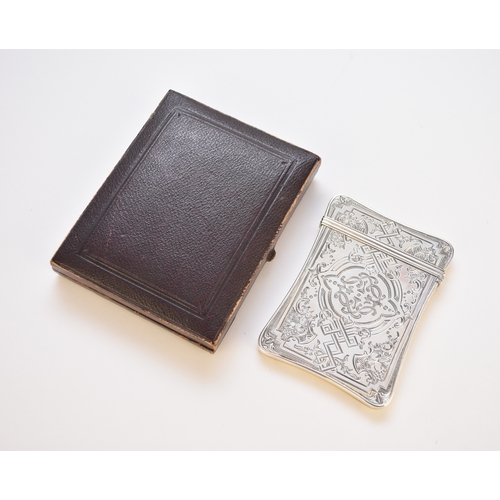 42 - A Victorian silver card case, Edward Smith, Birmingham 1860, with bright cut engraved decoration, 10... 