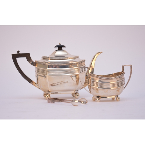 49 - An Edwardian silver teapot and sugar bowl, D & M Davis, Sheffield 1905, each piece of oval faceted f... 