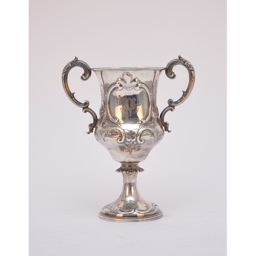 53 - A Victorian two handled silver trophy cup, Edward & John Barnard, London 1857, with embossed floral ... 