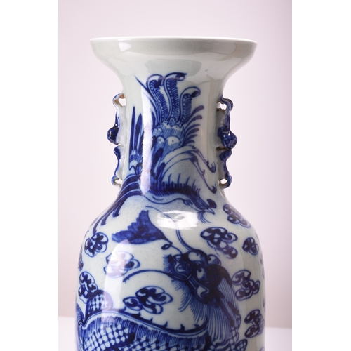 20 - A large Chinese blue and white celadon vase, 19th century With twin lion dog handles, decorated with... 