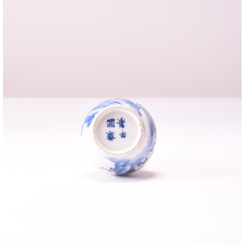 23 - A Chinese blue and white gourd shape vase, probably Qianlong Decorated with a luohan and monks in a ... 