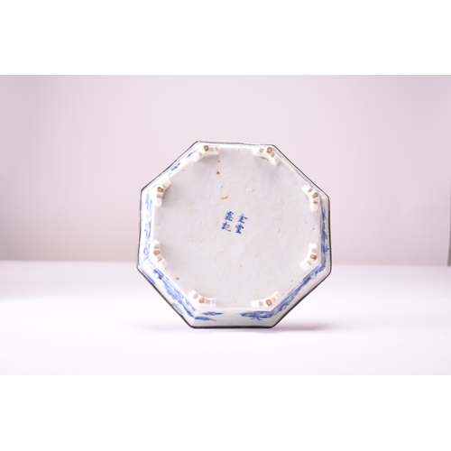 28 - A Chinese blue and white octagonal dish, 18th century Raised on eight shaped feet and decorated to t... 