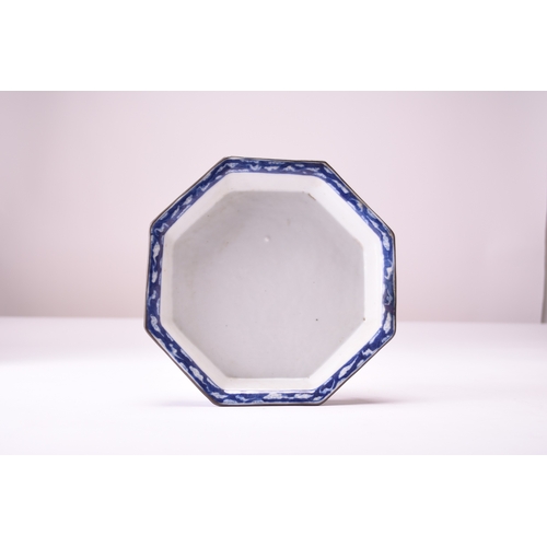 28 - A Chinese blue and white octagonal dish, 18th century Raised on eight shaped feet and decorated to t... 
