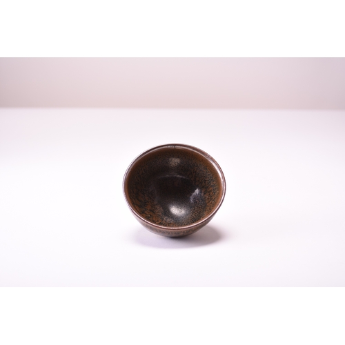 4 - A Chinese hare's fur bowl, Southern Song Dynasty The deep rounded sides are covered inside and out w... 