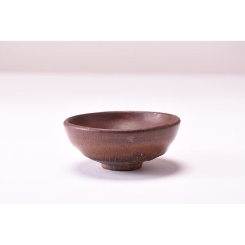 5 - A Chinese 'Hares Fur' teabowl, Southern Song Dynasty The deep rounded sides are covered inside and o... 