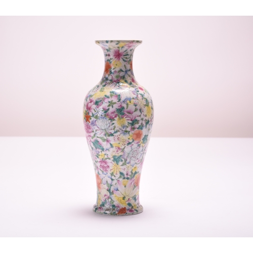 50 - A Chinese famille rose ‘thousand flower’ vase, Qianlong seal mark but Republic period Of baluster fo... 