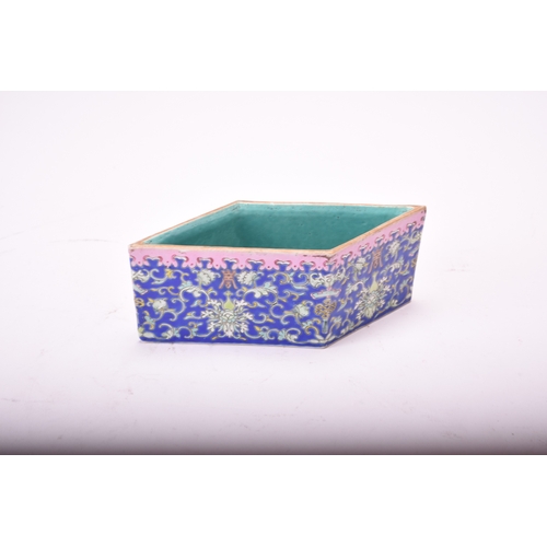 52 - A Chinese famille rose lozenge form jardiniere, Tongzhi seal mark and of the period Decorated in fal... 