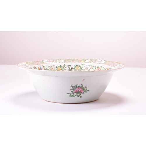 56 - A Chinese Canton famille rose punch bowl, 19th century Decorated with roses, auspicious fruits, fanc... 