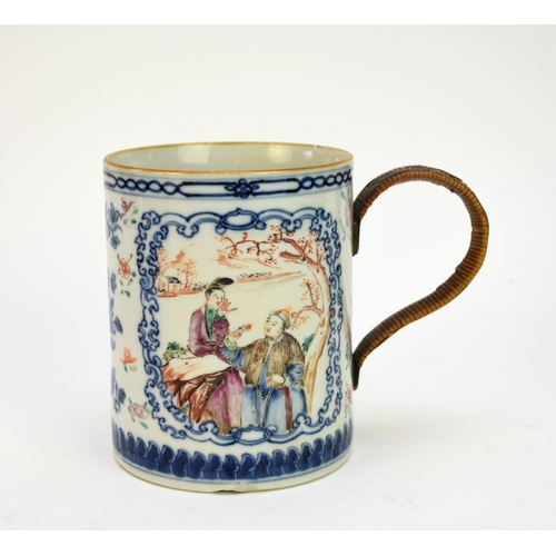 59 - A Chinese export porcelain mug, 18th century, blue and white with polychrome enamel, decorated with ... 