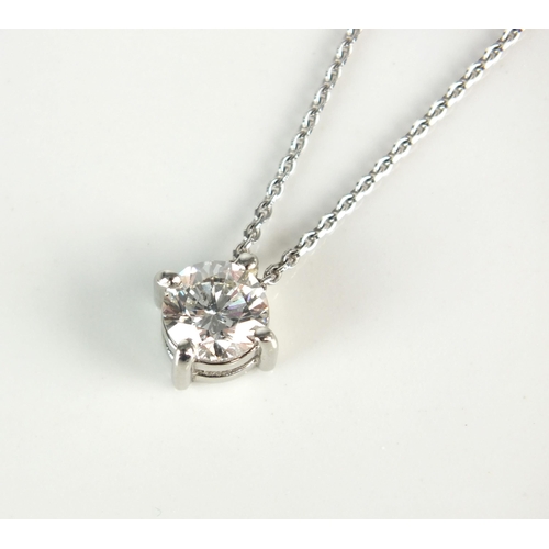 114 - A single stone diamond pendant on chain, the brilliant cut diamond claw set in white metal and suspe... 