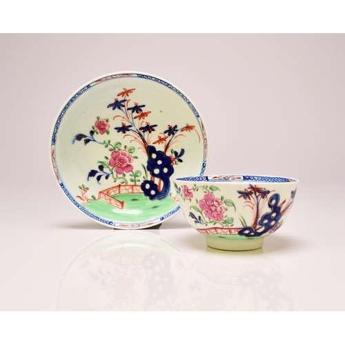 141 - A Lowestoft porcelain 'Redgrave' tea bowl and saucer, circa 1780, painted in overglaze enamels, unma... 