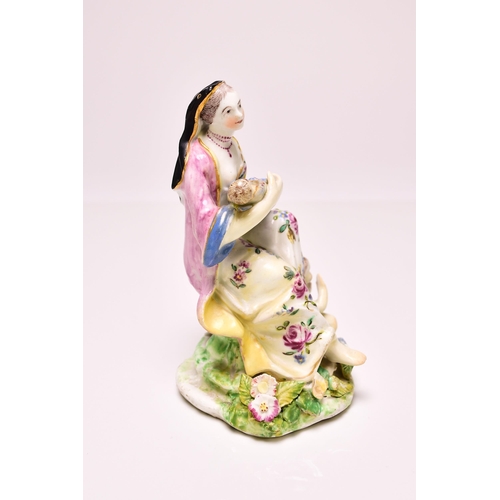 144 - A Bow porcelain model of Charity, circa 1760, the group featuring a seated woman nursing an infant w... 