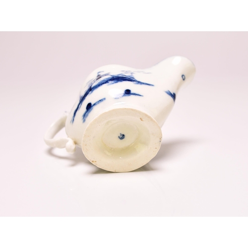 150 - A Caughley cream boat circa 1777-85, of 'gadroon' shape, painted in underglaze blue with the 'Rock H... 