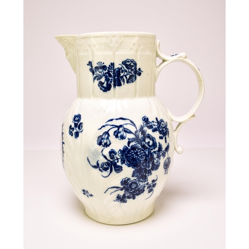 152 - A Caughley 'Bouquets' cabbage-leaf mask-head jug, circa 1785, transfer-printed in underglaze blue, a... 