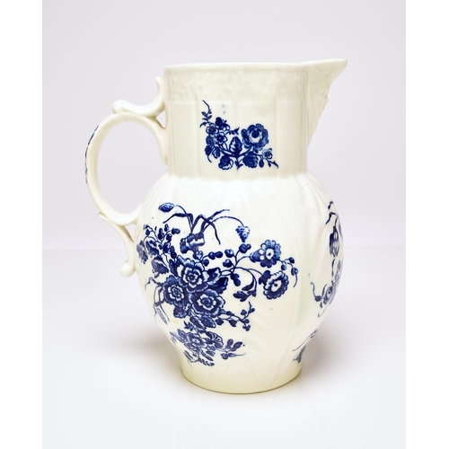 153 - A Caughley 'Bouquets' cabbage leaf maskhead jug, circa 1780-85, transfer-printed in underglaze blue,... 