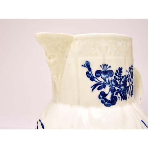 153 - A Caughley 'Bouquets' cabbage leaf maskhead jug, circa 1780-85, transfer-printed in underglaze blue,... 