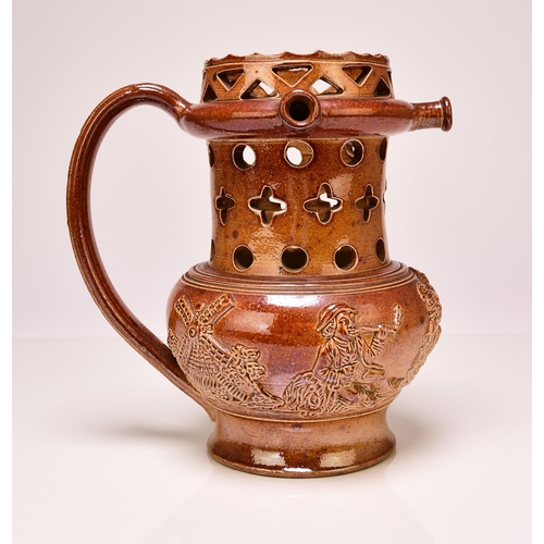 162 - A Brampton-type or Bourne (Derbyshire) salt-glazed puzzle jug, circa 1830-40, the neck pierced with ... 