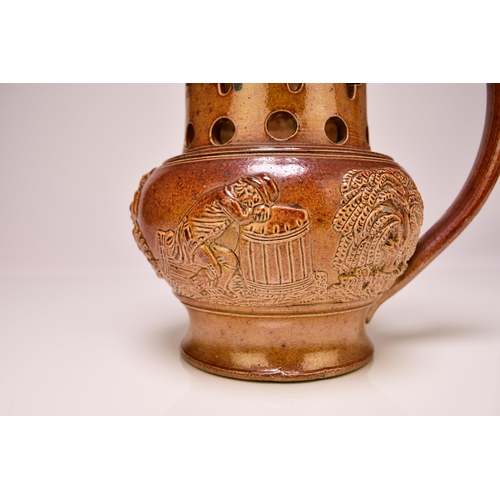 162 - A Brampton-type or Bourne (Derbyshire) salt-glazed puzzle jug, circa 1830-40, the neck pierced with ... 