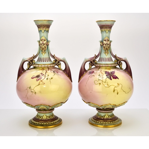 170 - A pair of Royal Worcester prismatic enamel vases, circa 1890, of twin-handled form with satyr masks ... 