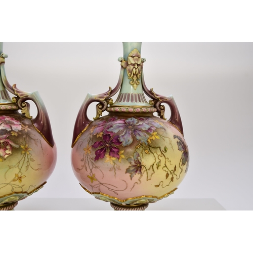 170 - A pair of Royal Worcester prismatic enamel vases, circa 1890, of twin-handled form with satyr masks ... 