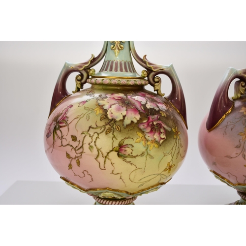 170 - A pair of Royal Worcester prismatic enamel vases, circa 1890, of twin-handled form with satyr masks ... 