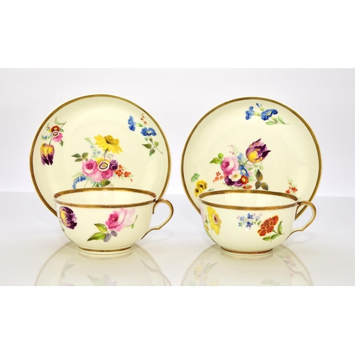 175 - A pair of Swansea teacups and saucers, circa 1815-17, with ear-shaped looped handles, painted with p... 