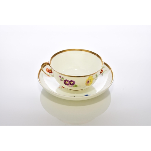 175 - A pair of Swansea teacups and saucers, circa 1815-17, with ear-shaped looped handles, painted with p... 