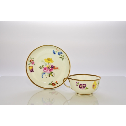 175 - A pair of Swansea teacups and saucers, circa 1815-17, with ear-shaped looped handles, painted with p... 