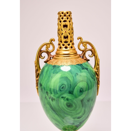 176 - A Coalport pedestal vase, circa 1900-1910 lacking cover, of twin-handled form with a malachite body ... 