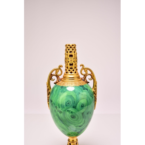 176 - A Coalport pedestal vase, circa 1900-1910 lacking cover, of twin-handled form with a malachite body ... 