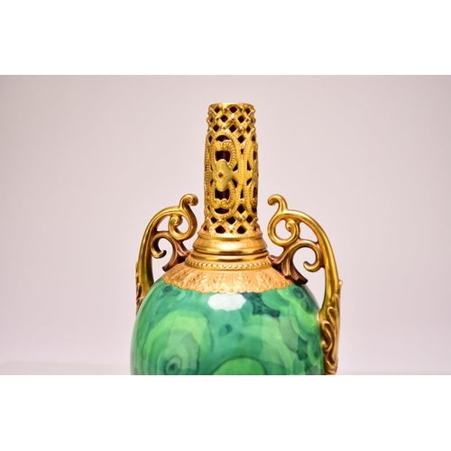 176 - A Coalport pedestal vase, circa 1900-1910 lacking cover, of twin-handled form with a malachite body ... 