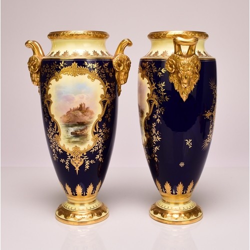 182 - A pair of Coalport vases, circa 1900-10 of tall, ovoid form, with twin rams head handles, the cobalt... 