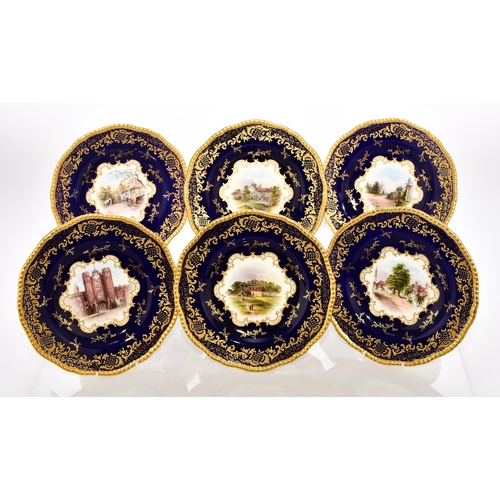 187 - A set of six Coalport dessert plates, early 20th century the cobalt border with elaborate raised and... 