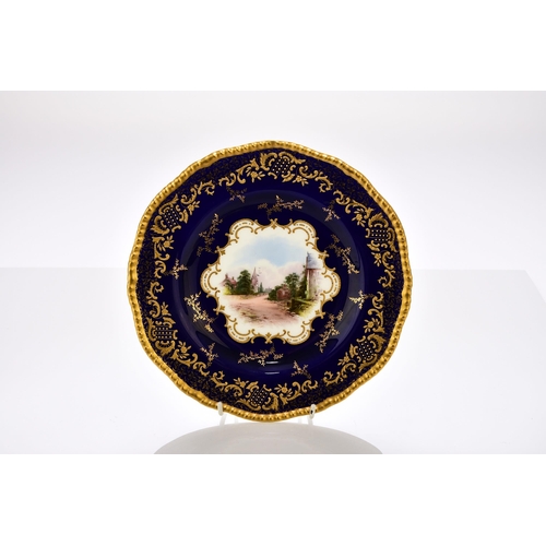 187 - A set of six Coalport dessert plates, early 20th century the cobalt border with elaborate raised and... 