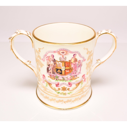 193 - A rare Coalport presentation loving cup, circa 1860 with feather moulded and gilt loop handles, prin... 