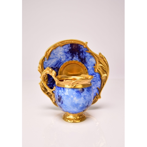 195 - A Coalport cabinet cup and saucer, late 19th/early 20th century blue simulated lapis lazuli ground w... 