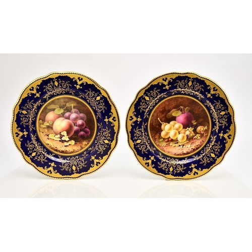 198 - A pair of Coalport scalloped cabinet plates, circa 1920, painted with still lives of fruit by Freder... 