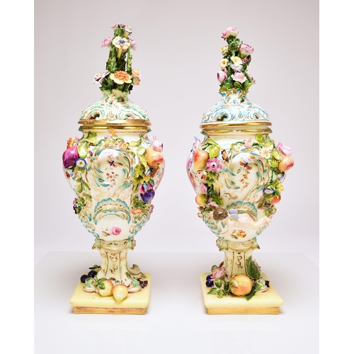 206 - A pair of rare Coalport 'Coalbrookdale' floral encrusted potpourri vases and covers, circa 1825-30 t... 