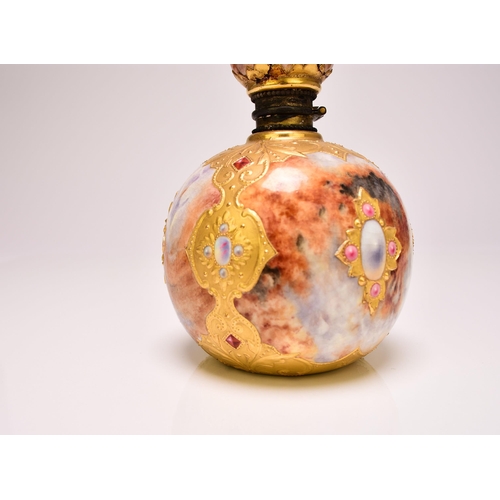 209 - A Coalport faux 'agate' perfume bottle and stopper, circa 1895-1900 of circular form with a ball sto... 